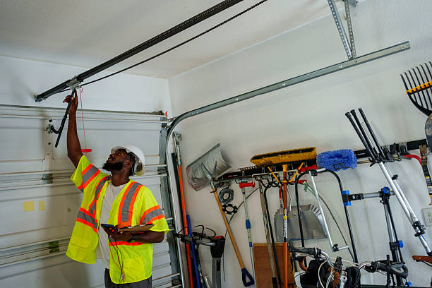 Professional Garage Door Panel Replacement technician working in North Pole, AK